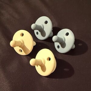 New AEIOU Pacifiers